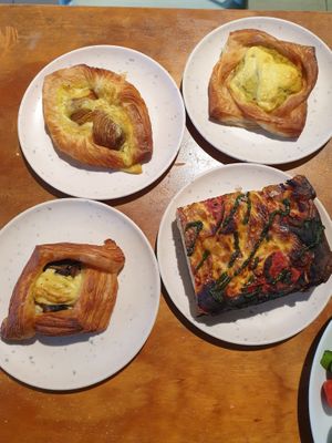 Potato truffle cheese danish, Mashed potato? cheese danish, Mushroom cheese danish, Pesto tomato mozzarella pizza slice at Miss Sina in Marrickville