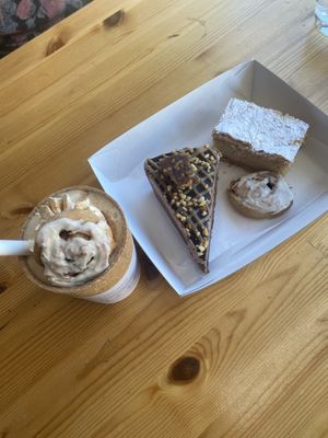 Vegan treats my husband had the Reece’s cake me  vanilla slice shared cinnamon bun latte and mini cinnamon bun   at Miss Sina in Marrickville