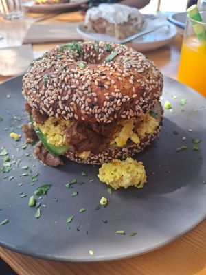Mushroom bulgogi, tofu scramble, cucumber, kimchi Mayo bagel at Miss Sina in Marrickville