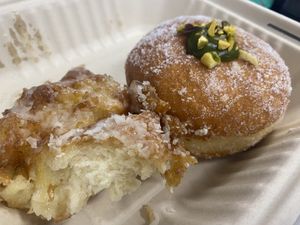 Pear fritter (left) and pistachio cream doughnut (right)  at Miss Sina in Marrickville