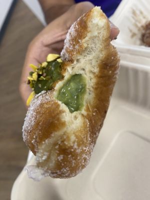 Pistachio cream doughnut interior 🤤  at Miss Sina in Marrickville