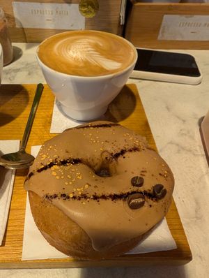 Vegan donut and oat milk coffee at Espresso Mafia  in Girona