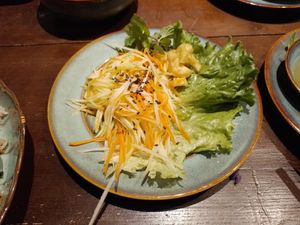 Green Mango And Black Sesame Salad. at Cai Mam Bistro - Signature Vegan in Hanoi