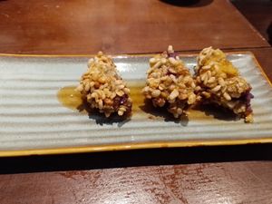 Deep Fried Local Potato With Hanoi's Young Rice, Passion Fruit Sauce. at Cai Mam Bistro - Signature Vegan in Hanoi