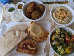 Delicious sample plate for only €12,- especially the falafel was really good! at Beyond Falafel in Quarteira