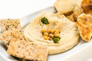 Home-made hummus with pita and gluten-free crackers at Beyond Falafel in Quarteira