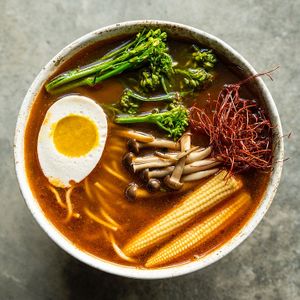 Spicy chili ramen with Cashew 'Egg', brocollini, mushrooms, baby corn at Yasai Ramen in Lisbon
