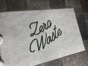 Cute mosaic at entry!  at Mason & Greens in Washington