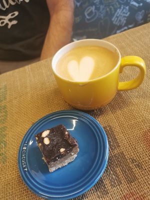 Cappuccino oats and home made vegan cookie at C&P Craft Coffee Roasters in Mossel Bay