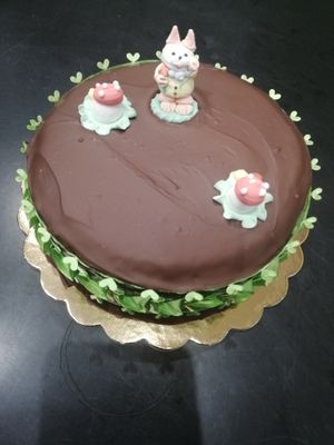 Torta al cioccolato ricoperta di cioccolato fondente con decorazioni per bimbi at Profumo di Sole in Pescara