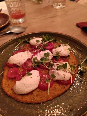 Carrot pizza with cashew cream at Soul Kitchen in Ghent
