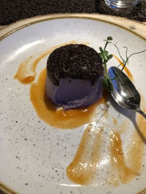 Berries pudding with apricot sauce   at Aidin Restaurant in Canazei