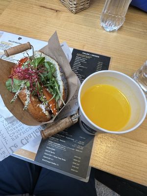 Vegan Avocado Bagel with Fresh Orange Juice  at Best Bagel Basilica in Budapest