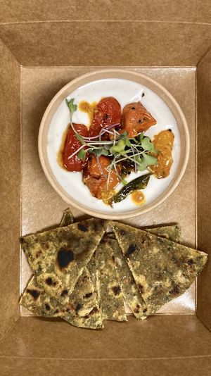 Tomato Raita Dip & Spinach Paratha   at Samosa Shack in Kingston