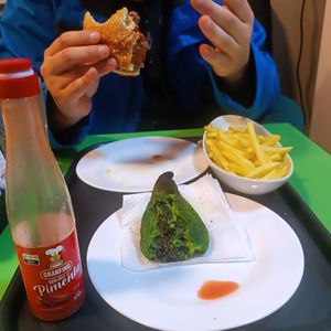 Coxinha de espinafre queimada ; combo de burguer com batata frita at Açougue Vegano - Flamengo in Rio De Janeiro