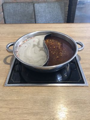 Duo of broths  at Seven Hotpot Restaurant in Abu Dhabi