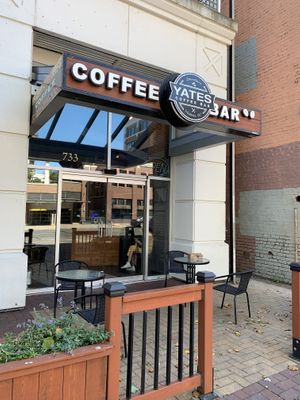 Front of building with outdoor seating  at Yates Coffee Bar in Victoria