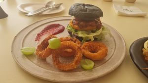 burger with onion rings and homemade ketchup at ARP - 아르프 in Busan