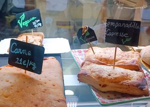 Empanada de verduras y empanadillas con tomate y queso at La Boca Comida Para Llevar in Santiago De Compostela