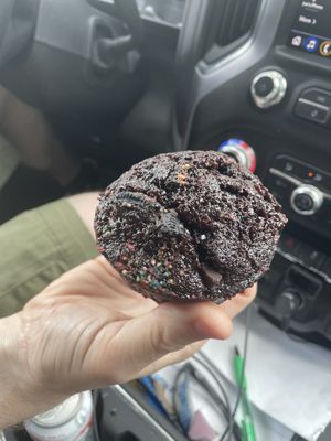 Chocolate Oreo muffin with rainbow sanding sugar    at Yellow & Lavender  in Nashville
