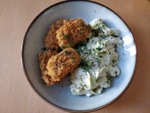 Fried tofu with zucchini slices and vegan yogurt at Seed Cuisine in Bucharest