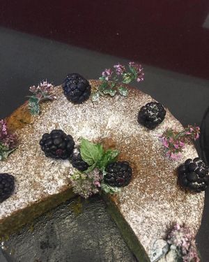 Matcha green tea and blackberry cake.  at Lamingtons in Biggar