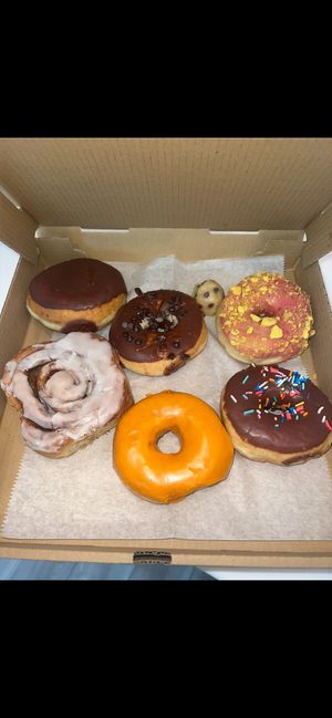 Look at the beauties. Take it in  at Dottie's Donuts - Rochelle Ave in Philadelphia