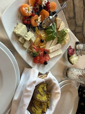 Vegan cheese plate with homemade bread   at PiranArt Restaurant & Gelateria & Caffeteria in Piran