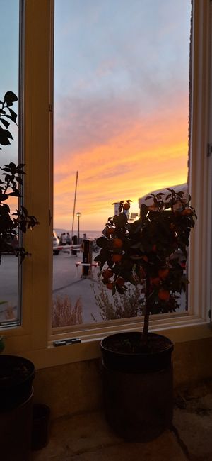 One table for two people is right next to the window, so you can enjoy a beautiful sunset while waiting at PiranArt Restaurant & Gelateria & Caffeteria in Piran