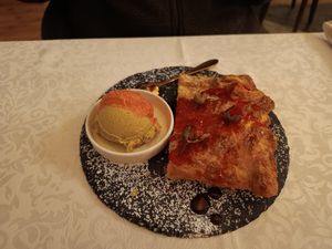 Strawberry and pistachio ice cream with strawberry strudel at PiranArt Restaurant & Gelateria & Caffeteria in Piran