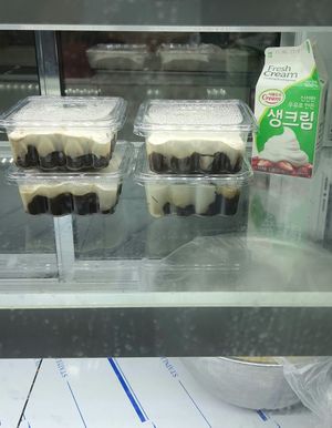 fridge with bottle cakes, non-vegan cream at Miam-o Bread 미얌오브래드 in Seoul