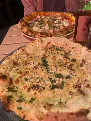 Far pizza is pepperoni and closest is carbonara   at RAZZO Vegan Pizza Bar in Cologne