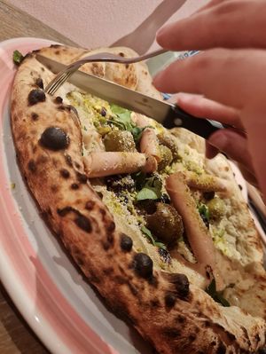 Pizza Mortadella e pistacchio at RAZZO Vegan Pizza Bar in Cologne