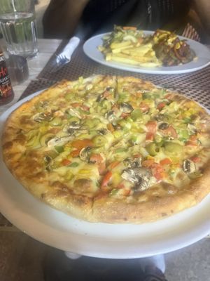 Vegan vegetable Pizza   at Vibes - Restaurant & Cafe in Hurghada