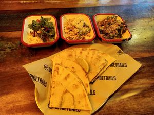 Salad starters to share, noodle salad great, the others just good. Garlic flatbread not very garlicky. at Spicetrails in Freiburg