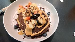 Choc pancakes with blueberries and banana at Veganerie - Kingkeaw in Bangkok