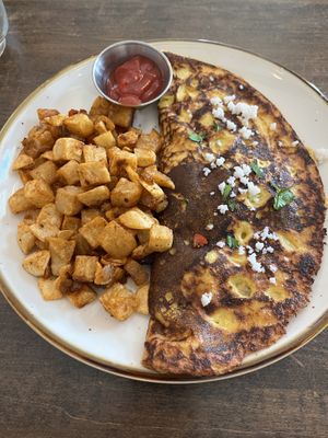 Wild mushroom omelet with breakfast potatoes   at Good Intentions in St Petersburg