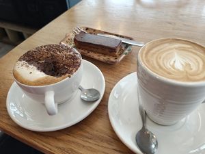 Cappuccino, latte and cake at Zappa's in Totnes