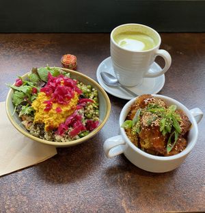 Small salad bowl, matcha latte 💚 and crispy GF cauliflower bites 🧡   at Zappa's in Totnes