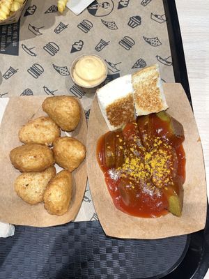 Cheese nuggs, chipotle mayo, curry vurst  at VINCENT - The Playce in Berlin