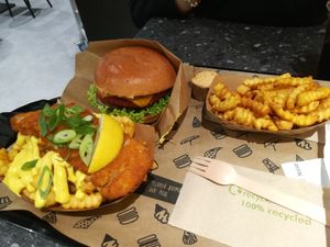 Cheeseburger (back) and fish n chips (front)  at VINCENT - The Playce in Berlin