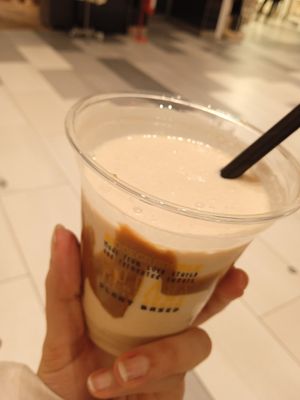 Cold vegan milkshake with winter species. 4€ and it's worth every cent! Also the cheese balls with dip are incredible!! at VINCENT - The Playce in Berlin