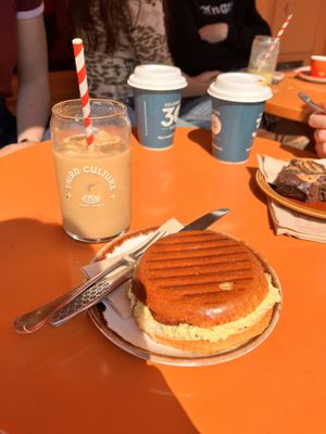 Breakfast bun and orange latte  at Third Culture in East London