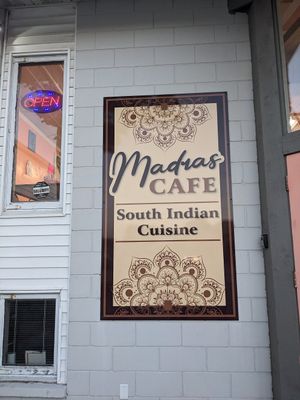 The restaurant sign at Madras Cafe in Appleton