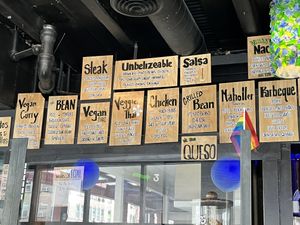 Labeled vegan options on menu!  at Neato Burrito in Spokane