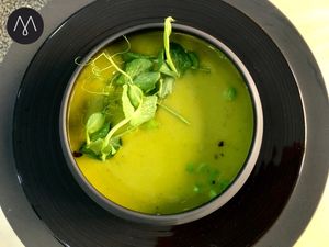 Green pea cream soup at Mishto Café & Deli in Budapest