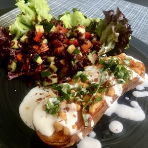 Sweet potato with chili beans and black rice saladd  at Mishto Café & Deli in Budapest