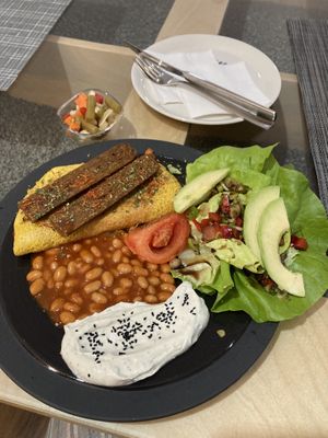 Breakfast with chickpea omelette   at Mishto Café & Deli in Budapest