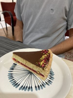 Pistachio and raspberry chocolate tart   at Mishto Café & Deli in Budapest