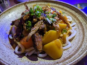 Curry noodles with seitan and mushrooms at Modoki Funky Roll in Barcelona